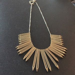 Gold spiked and fringe statement necklace